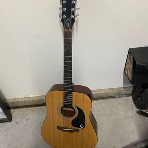 Epiphone guitar, I used it for practice for a while and 2 are strings broken